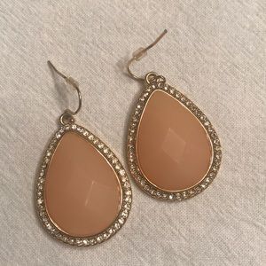 Pink and rhinestone earrings.